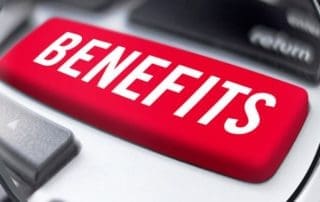 Benefits of Invoice Factoring Keyboard with Magnifying Glass