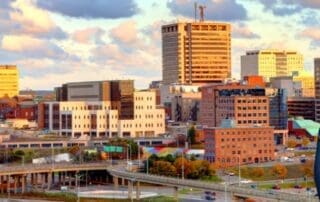 New Brunswick Government Contractor Payment Terms Guide - government contractor with New Brunswick in background.